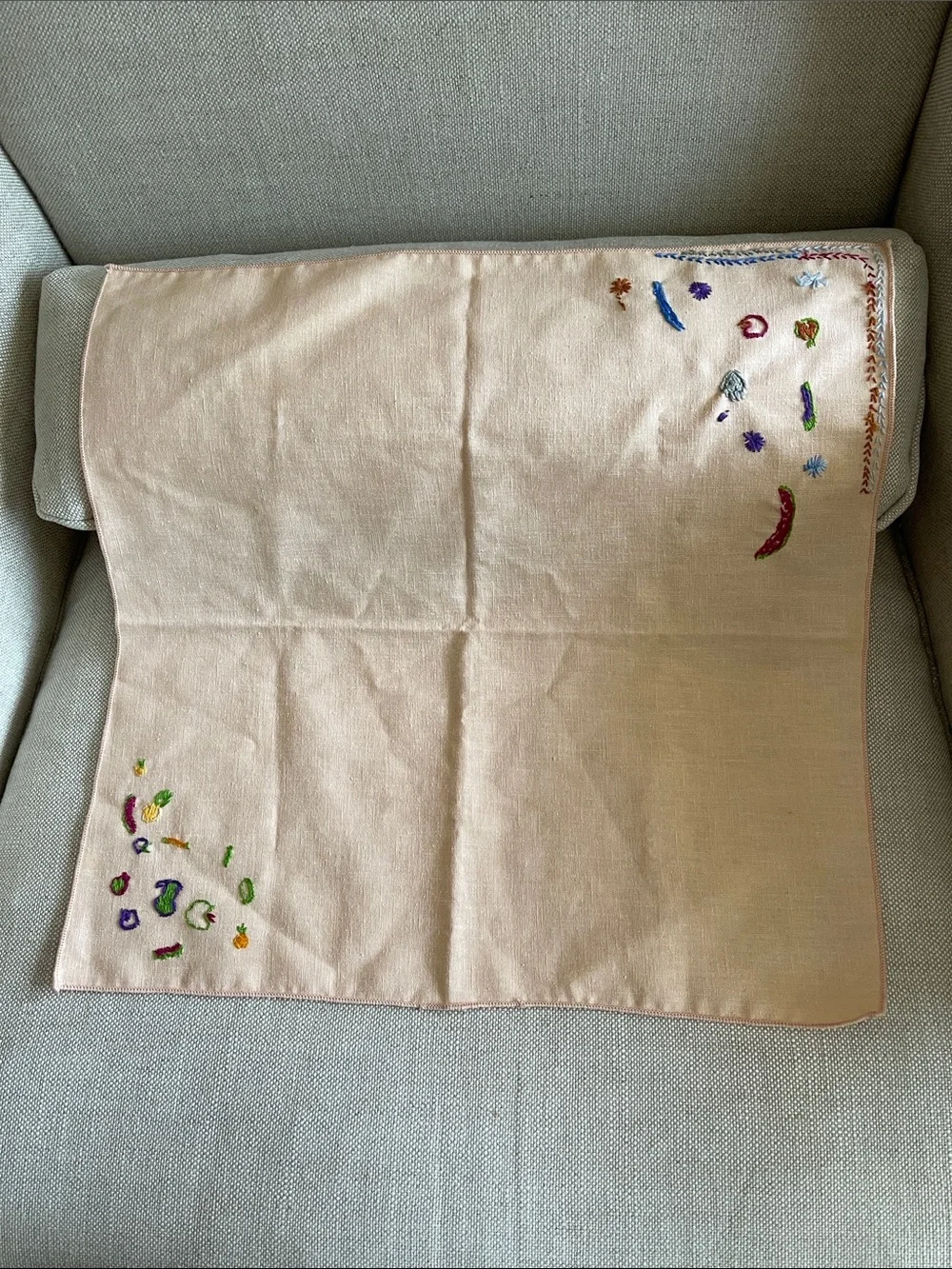 Hand-Embroidered Linen Napkin with Colorful Floral Accents